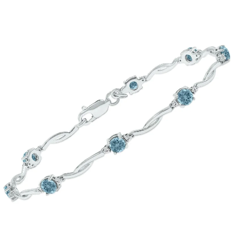 Marquee Aquamarine and Natural Diamond Braided Wave Bracelet in .925 Sterling Silver