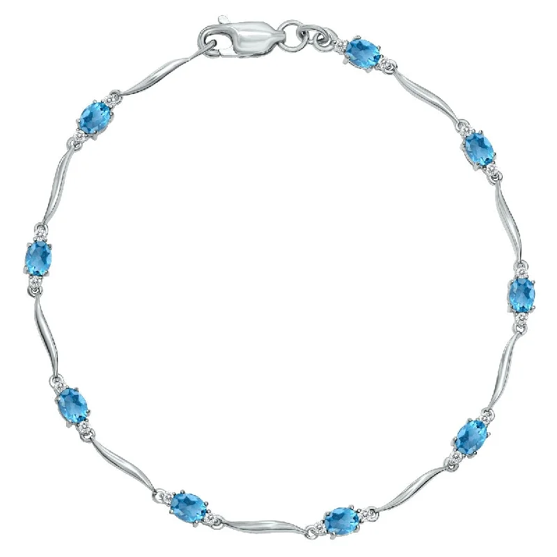 Marquee Blue Topaz and Diamond Wave Link Bracelet in .925 Sterling Silver