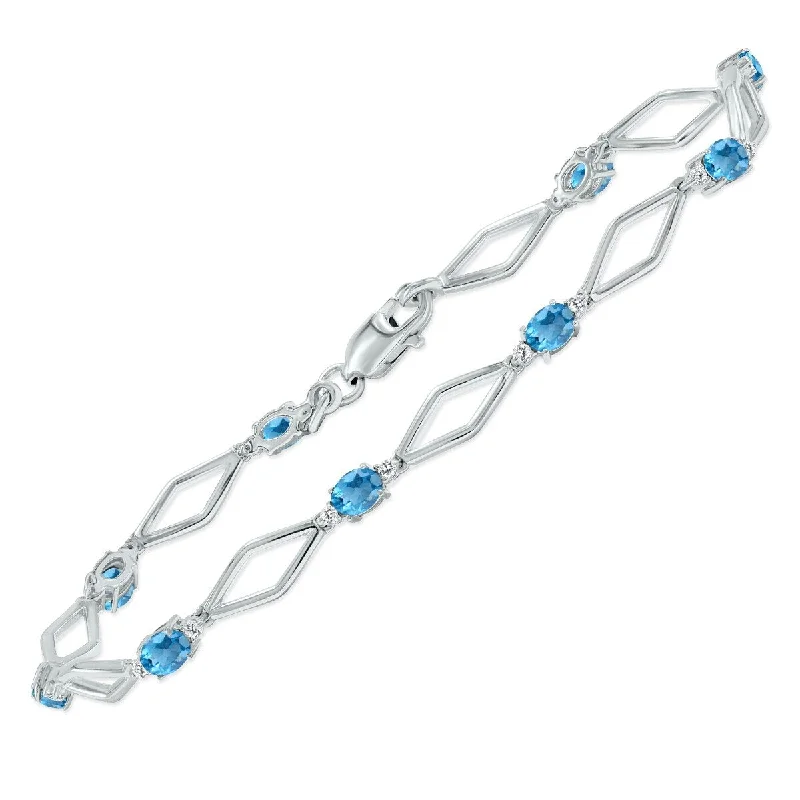 Marquee Blue Topaz and Natural Diamond Star Link Bracelet in .925 Sterling Silver