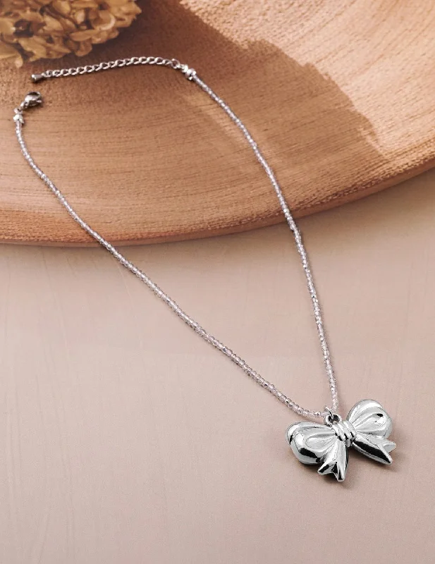 Rhodium Plated Silver Bow Pendant Necklace with Crystal Beaded Chain