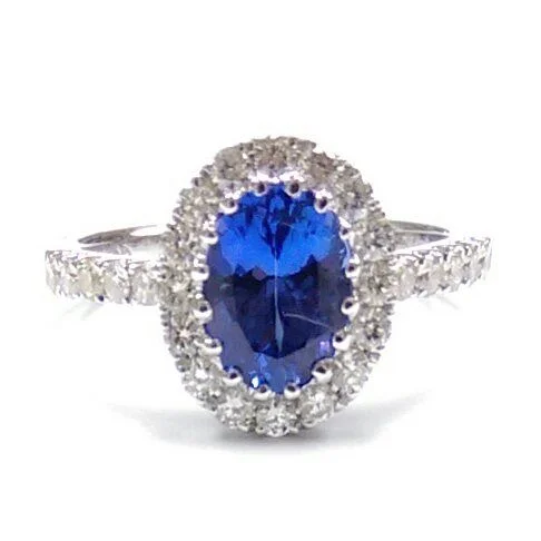 6X8MM Oval Tanzanite and Diamond Halo Ring in 14KT White Gold