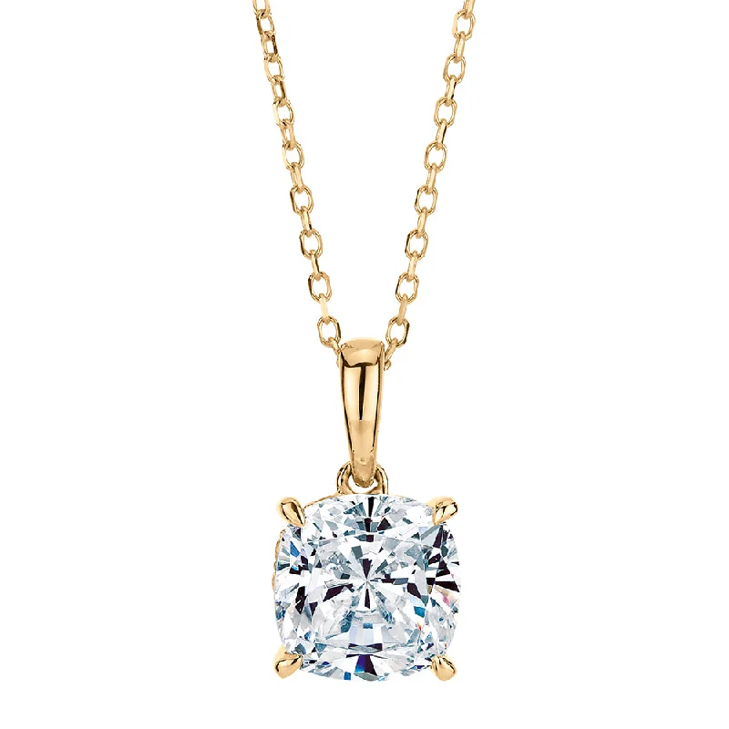 Cushion and Round Brilliant solitaire pendant with 1.34 carats* of diamond simulants in 10 carat yellow gold